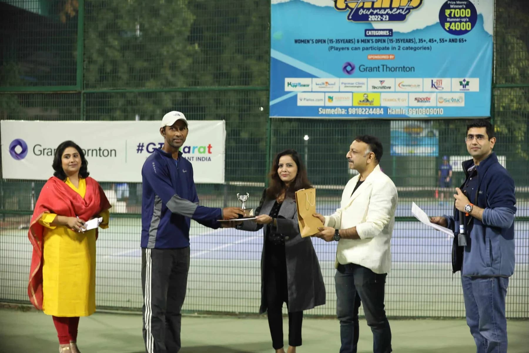 Players receiving recognition at an RGT presentation