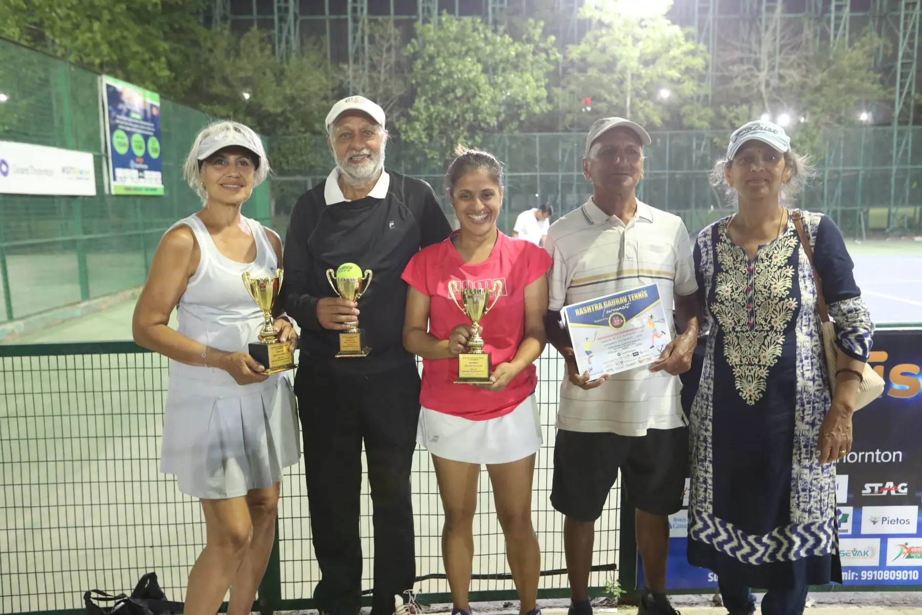 Winners and organisers with trophies