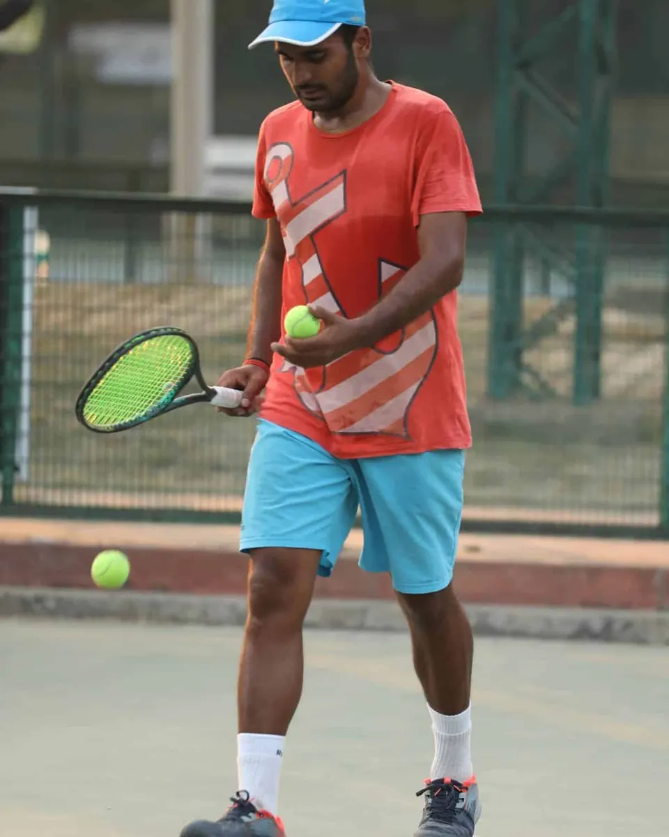 A player bounces the ball before serving