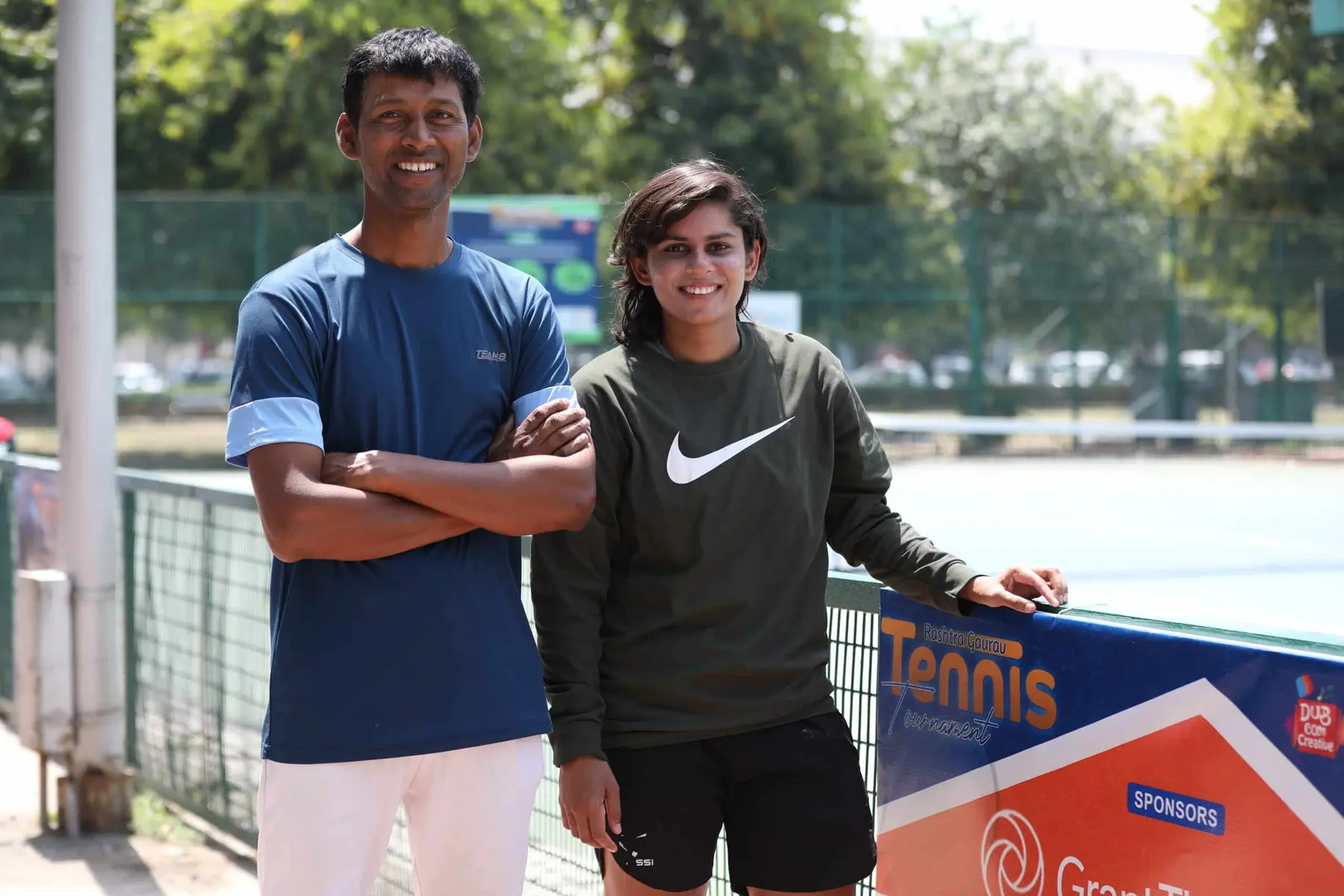 Two players courtside at RGT
