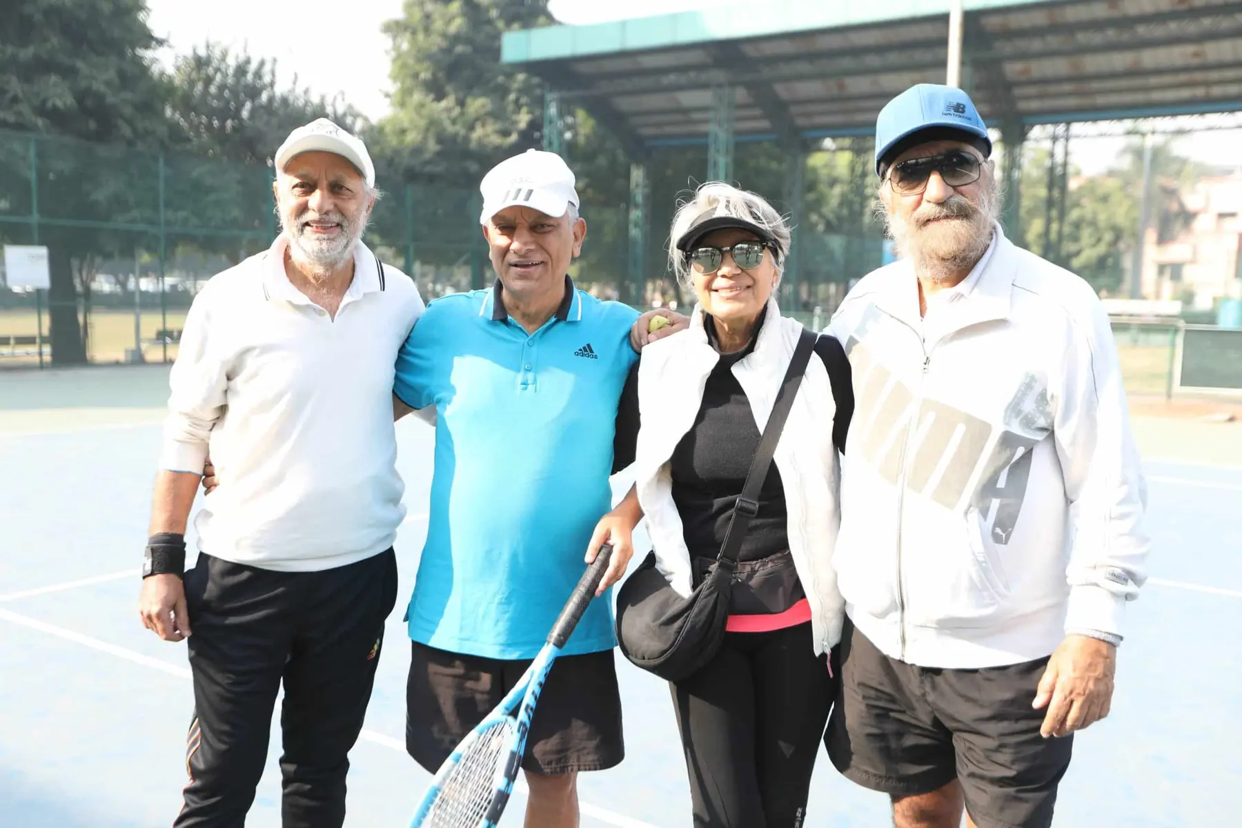 Veteran players together on court